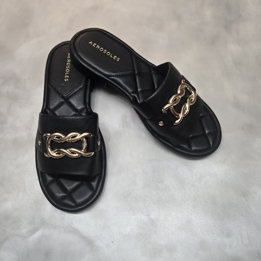 AEROSOLES Black Slide Sandals with Gold Chain Accent